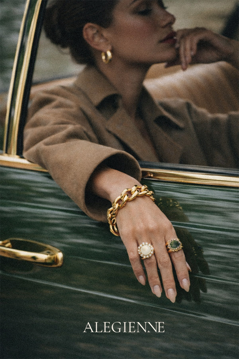 Alegienne campaign image featuring gold jewellery and an emerald green car, art directed for a studio rjl case study